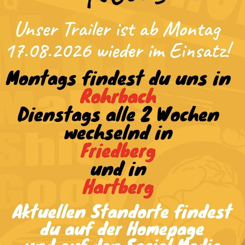 A yellow poster with white and red text informs about the trailer's schedule. It will be in Rohrbach on Mondays and in Friedberg and Hartberg on alternate Tuesdays. Check the homepage for current locations.
