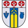 Das Wappen zeigt drei rote Kreise mit Kreuzen oben, einen blauen Schild mit einem weißen Symbol unten links und einen gelben und blauen Bereich mit zwei gelben Figuren in der Mitte.