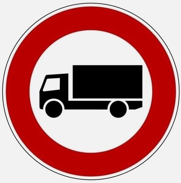 Ein roter Kreis mit weißem Hintergrund und einem schwarzen LKW-Symbol in der Mitte, was ein Verbotszeichen anzeigt.