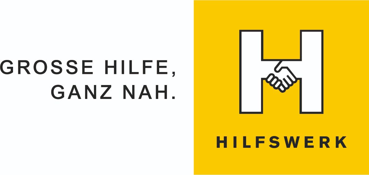 Ein gelbes und weißes Logo mit dem Text 'SE HILFE, ANF NACH.' und einem Händeschüttelsymbol. Das Logo ist für 'HILFS'.
