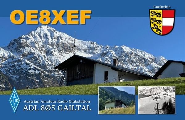 Plakat für österreichische Amateurfunk-Clubstation mit verschneiter Berg, Haus und Wappen. Stationskennzeichen OE8XEF und Standort Gailtal.