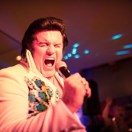Microphone, Adult, Male, Man, Person, Lighting, Finger, Solo Performance, Face, Urban