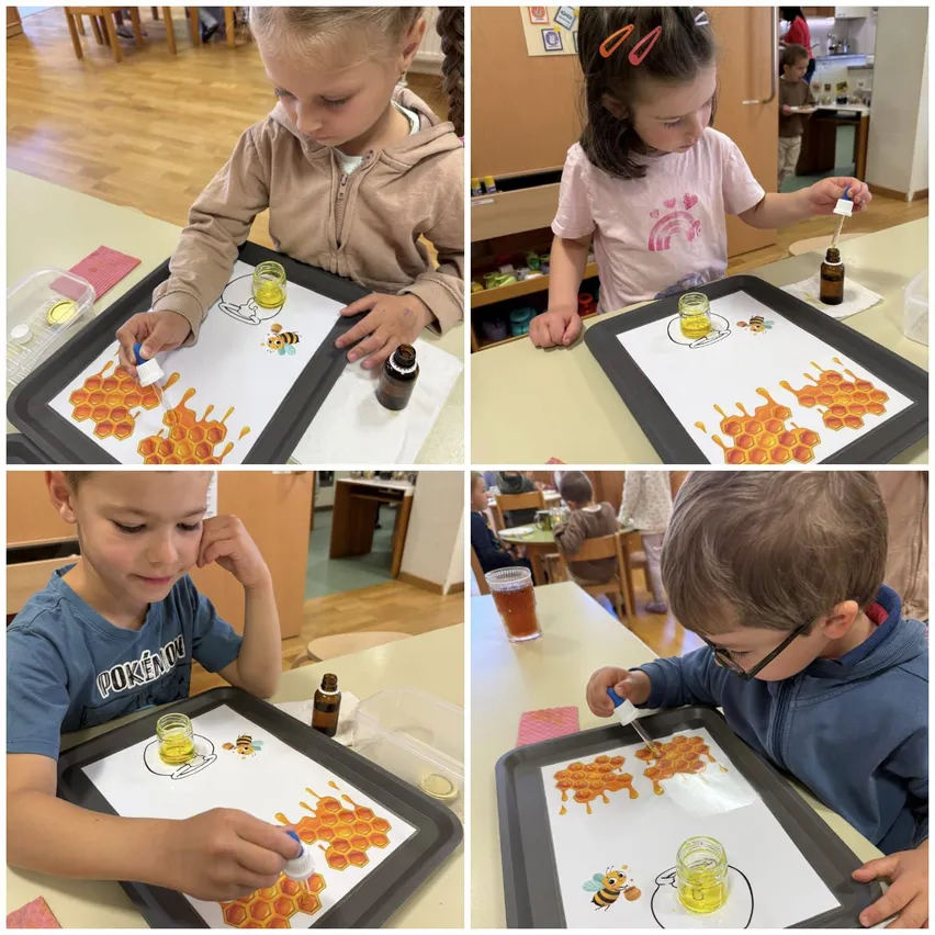 Vier Kinder nehmen an einer Honigherstellungsaktivität teil. Sie verwenden Tabletts und Pipetten, um Flüssigkeit in Wabenmuster zu tropfen.