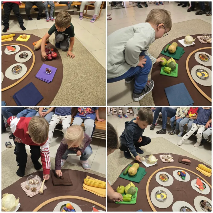 Eine Gruppe von Kindern versammelt sich um einen Tisch mit verschiedenen Lebensmitteln darauf. Einige knien und nehmen Lebensmittel auf, während andere auf dem Boden sitzen.