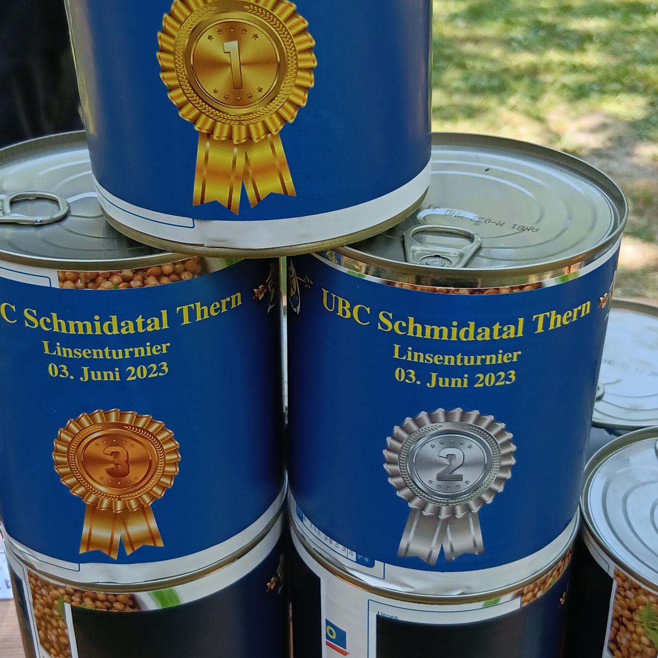 Bild enthält, Tin, Can, Person, Aluminium