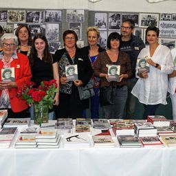Adult, Female, Person, Woman, Book, Publication, People, Flower Arrangement, Flower Bouquet, Man