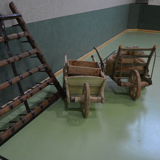 Wood, Plywood, Floor, Machine, Wheel, Flooring, Transportation, Vehicle, Wagon, Gun