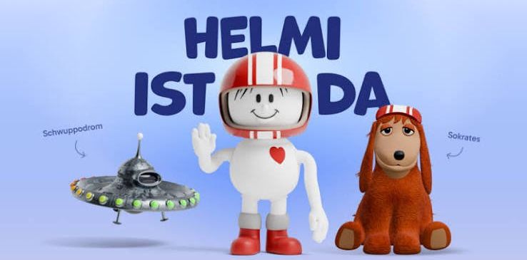 Eine Cartoon-Bild mit einem Roboter, einem Hund und einem Raumschiff. Der Roboter trägt einen Helm und winkt. Der Hund sitzt und schaut den Roboter an. Das Raumschiff befindet sich hinter dem Roboter. Der Text lautet 'HELMI IST DA'.