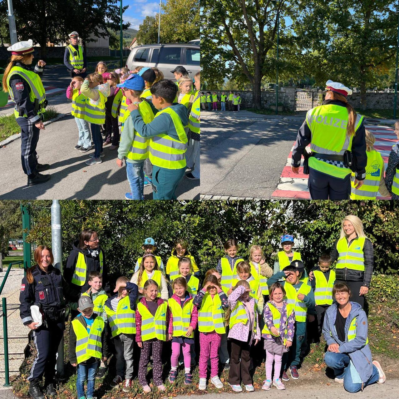 Eine Gruppe von Kindern in Warnwesten wird von einer Polizistin am Straßenrand unterrichtet.