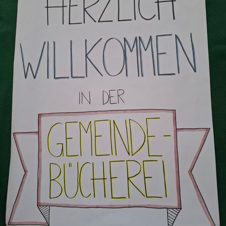 Bild enthält, Text, Banner, Symbol