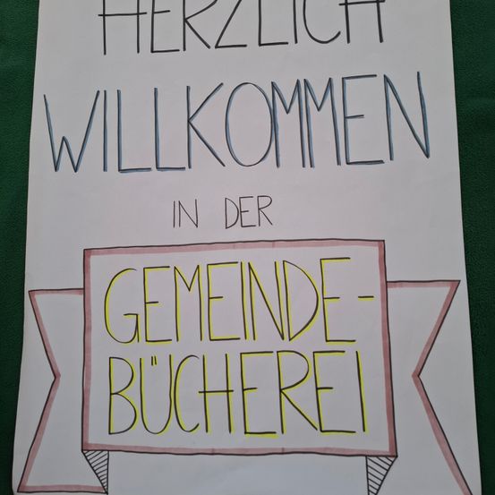 Bild enthält, Text, Banner, Symbol