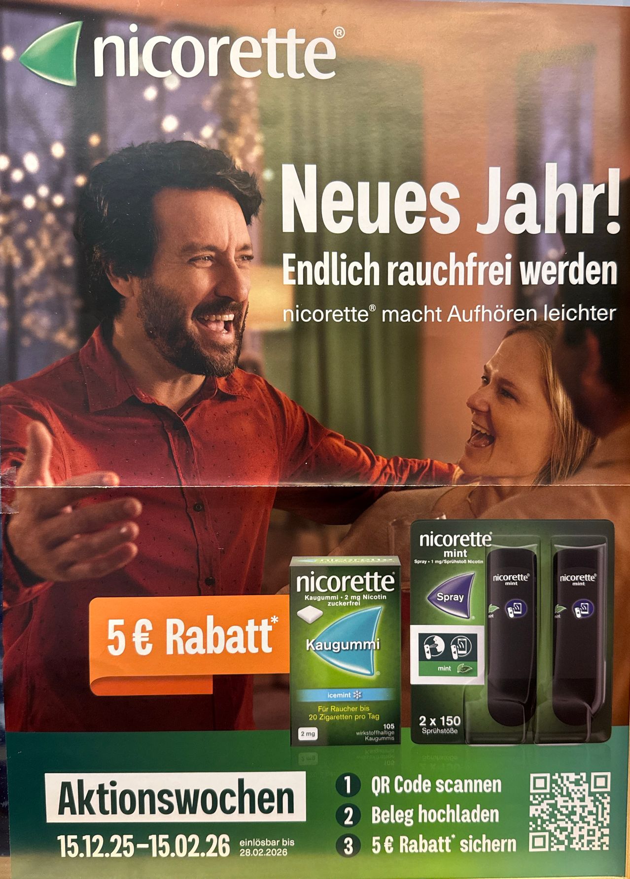 Poster for Nicorette gum and spray, featuring a happy couple. It says, 'New Year! Finally smoke-free. Nicorette makes quitting easier.' There is a 5 euro discount offer.