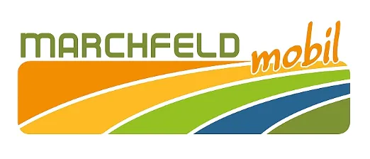 Das Logo für Marchfeld mobil zeigt einen lebhaften Farbverlauf von Gelb über Grün zu Blau, mit dem Text 'MARCHFELD mobil' in fetten, großgeschriebenen Buchstaben.