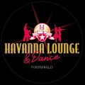 Schwarzes kreisförmiges Logo für Havana Lounge & Dance mit Silhouetten tanzender Paare in Rot, einem goldenen Stern und Strahlen im Hintergrund. Die Worte 'HAVANA LOUNGE & Dance' und 'Furstenfeld' sind in Weiß geschrieben.