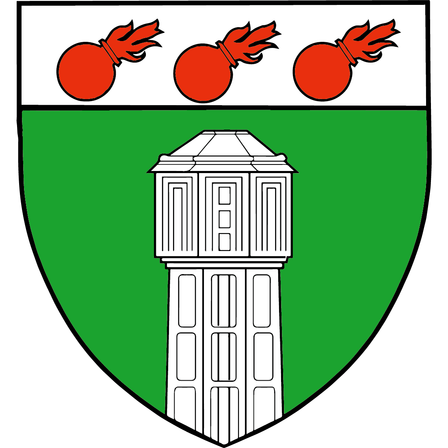 Ein Schild mit grüner Basis und einem weißen Turm in der Mitte, drei rote Bomben mit Flammen oben auf einem weißen Streifen über dem Turm.