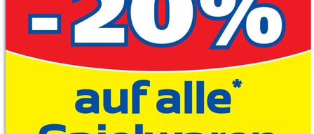 Ein gelbes und rotes Schild mit blauem Text, das -20% auf alle Spielwaren anzeigt.