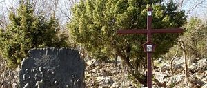 Image contains, Cross, Symbol, Rock, Tomb, Gravestone, Person, Graveyard, Outdoors