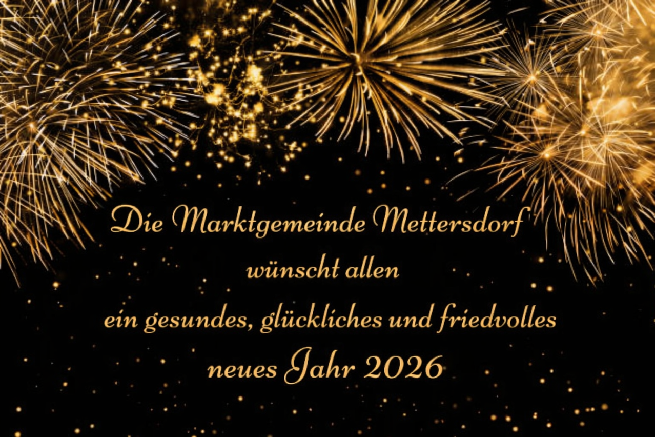 Ein schwarzer Hintergrund mit goldenen Feuerwerken. Unten steht 'Die Marktgemeinde Mettersdorf wünscht allen ein gesundes, glückliches und friedvolles neues Jahr 2026.'