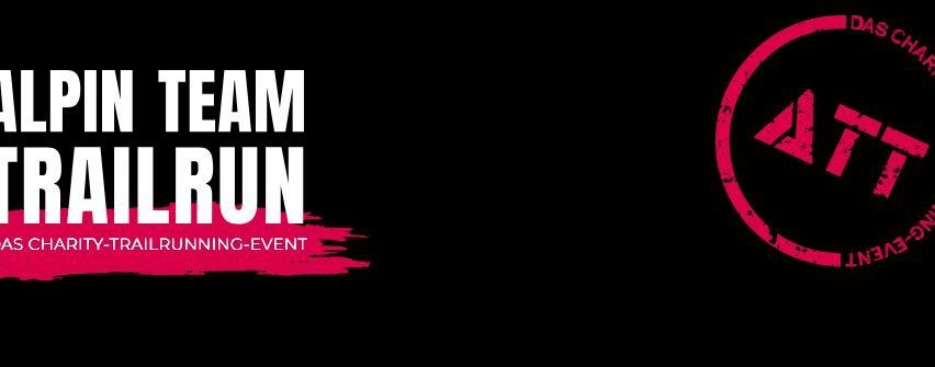 Ein Poster für das Spin Team Trailrun, ein wohltätige Traillauf-Event, auf schwarzem Hintergrund mit weißen und roten Texten. Das Logo ist ein roter Kreis mit weißen Buchstaben und einem pinkfarbenen Umriss.