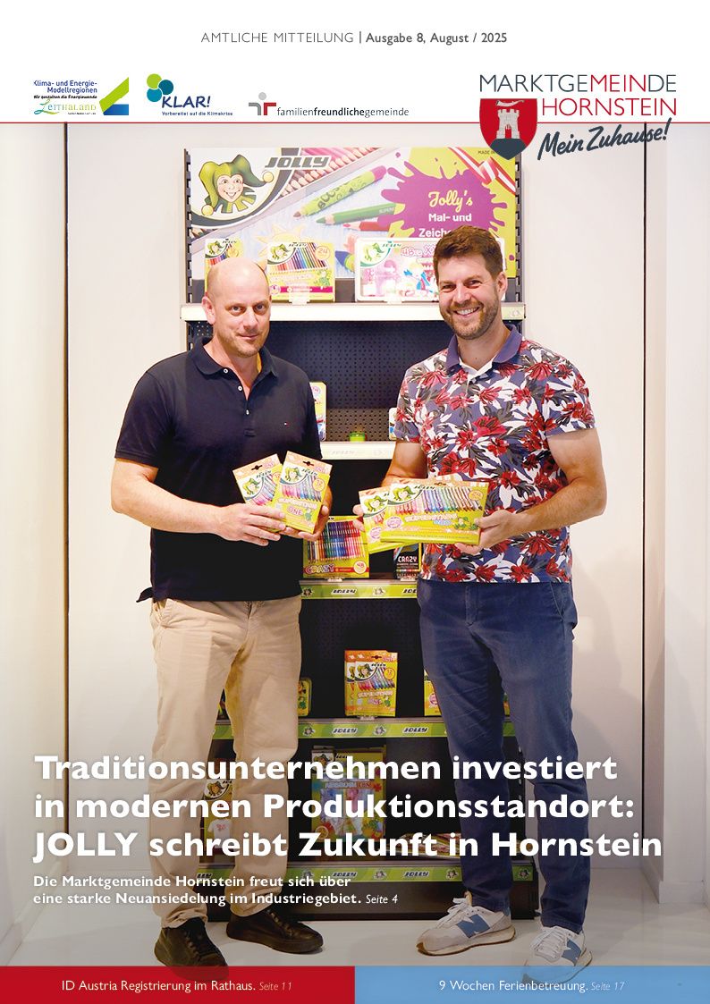 Zwei Männer stehen vor einem Geschäft, das mit bunten Verpackungen von Jolly's Mal- und Zeichensets gefüllt ist. Der Mann auf der linken Seite hält zwei Verpackungen, während der Mann auf der rechten Seite lächelt und eine Verpackung hält. Das Geschäft zeigt die Worte 'Jolly's Mal- und Zeichen'. Der Text am unteren Rand lautet 'Traditionsunternehmen investiert in modernen Produktionsstandort: JOLLY schreibt Zukunft in Hornstein'.