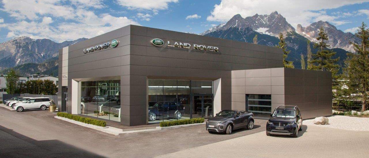 Bild enthält, Car, Car Dealership, Transportation, Vehicle, Architecture, Building, Machine, Wheel