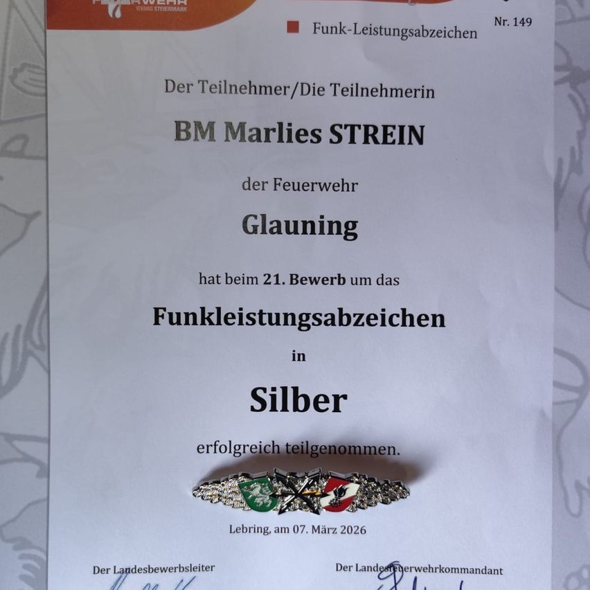 Zertifikat für den erfolgreichen Abschluss der Funkleistungsprüfung in Silber. Vergeben an Marlene Strein der Feuerwehr Glauning am 07. März 2026. Beinhaltet ein Abzeichen.