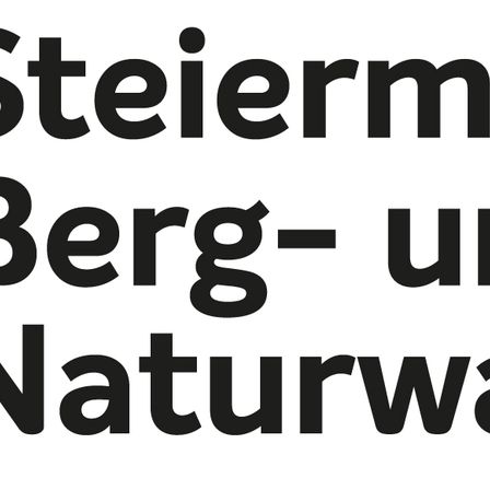 Schwarzer Text auf weißem Hintergrund lautet 'Steiermark Berg- und Naturwa'.