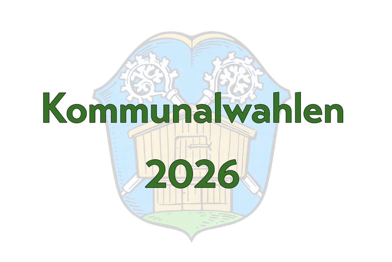 Ein Logo für Kommunalwahlen im Jahr 2026 mit einem Schild, einer Scheune, Zahnrädern und der Jahreszahl 2026.