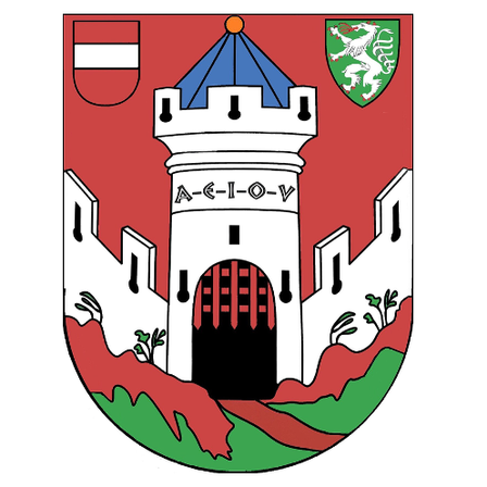 Ein Wappenschild mit einem roten Hintergrund, einem weißen Schloss mit blauem Dach und einem kleineren grünen Schild mit einem weißen Löwen auf der rechten Seite.
