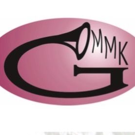 Das Bild zeigt das Logo für Marktmusikkapelle Garsten, das auf einem weißen Hintergrund dargestellt ist. Das Logo enthält den Text 'Marktmusikkapelle Garsten' in schwarz geschrieben.