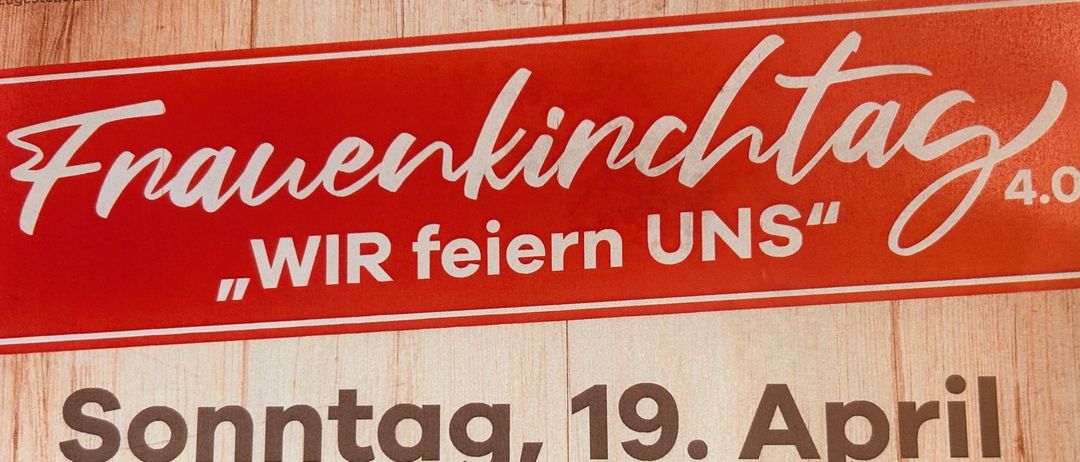 A red sign on a wooden surface says 'Bauenkinctag Wir feiern UNS'. Below it, the date is Sunday, April 19, 10 AM at Valentin-Leitgeb-Park in Kühndorf.