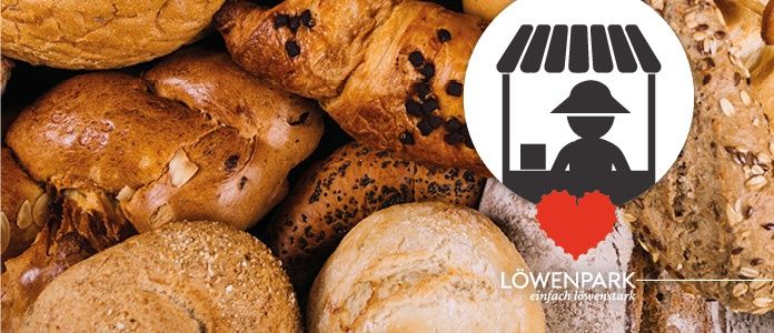 Eine Sammlung verschiedener Brotsorten mit einem Bäckerei-Logo und einer Personenikone, vor einem Haufen Brot platziert.