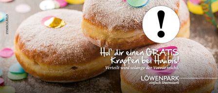 Eine Werbung fur kostenlose Krapfen bei Haubi's. Solange der Vorrat reicht. Der Text ist auf Deutsch.