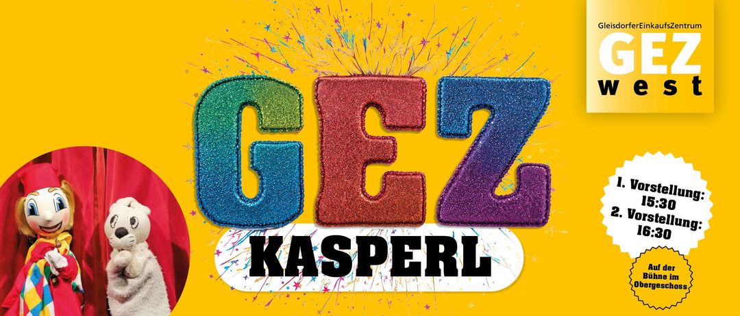 Ein leuchtend gelber Hintergrund mit farbenfrohen Buchstaben G, E und Z, zusammen mit dem Wort KASPERL in Schwarz. Die Buchstaben haben einen glitzernden Effekt und sind von bunten Sternen umgeben.