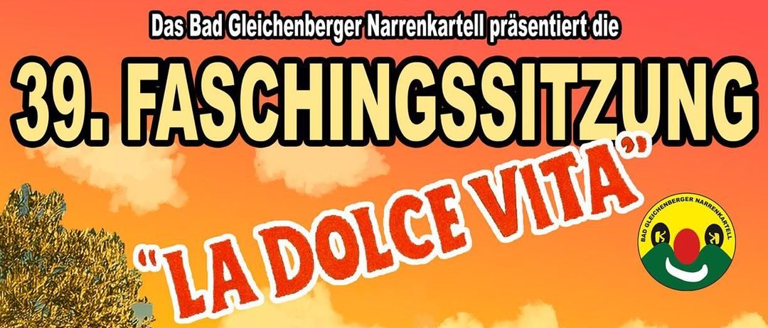 Plakat für die 39. Faschingssitzung mit dem Komikerduo La Dolce Vita. Termine sind Freitag, 13., Samstag, 14. und Sonntag, 15. Februar 2026. Zeiten sind 19:00, 19:00 und 17:00 Uhr. Veranstaltungsort ist Gleichenberg-Halle. Zwei Männer in einem Auto mit einem rosa Schwimmring obenauf.