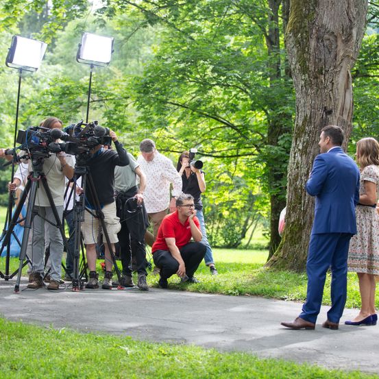 Person, Adult, Male, Man, Jeans, Shoe, Paparazzi, Tripod, Shorts, Coat