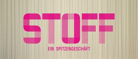 A poster for the film 'STOFF', featuring clothes hanging on a wall with a woman in the background. The title is in bold pink letters with a subtitle in German, 'EIN SPITZENGESCHAT'. There is a watermark in the bottom left corner.