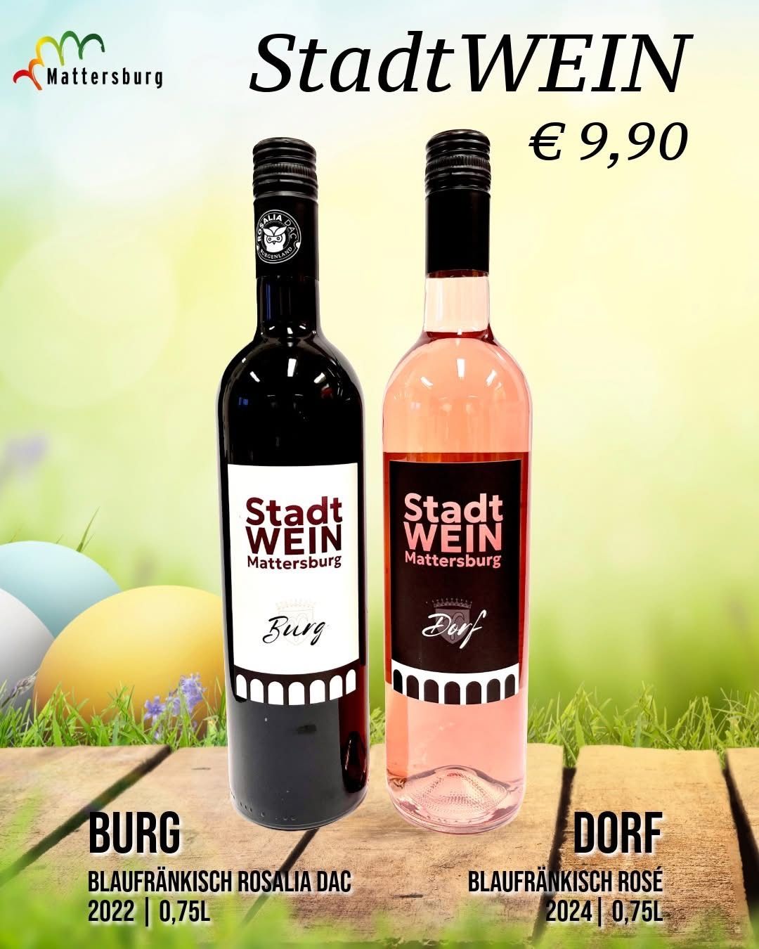 Two bottles of wine labeled Burg and Dorf, priced at 9.90 euros, displayed on a wooden surface with Easter eggs and flowers in the background.