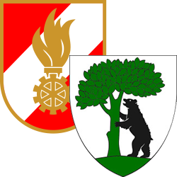 Das Bild zeigt einen Schild, der in zwei Teile geteilt ist. Die linke Hälfte hat einen roten und weißen Hintergrund mit einer goldenen Flamme und einem Zahnrad-Symbol. Die rechte Hälfte hat einen grünen Feld mit einem Bären, der auf einem Baumstumpf steht.