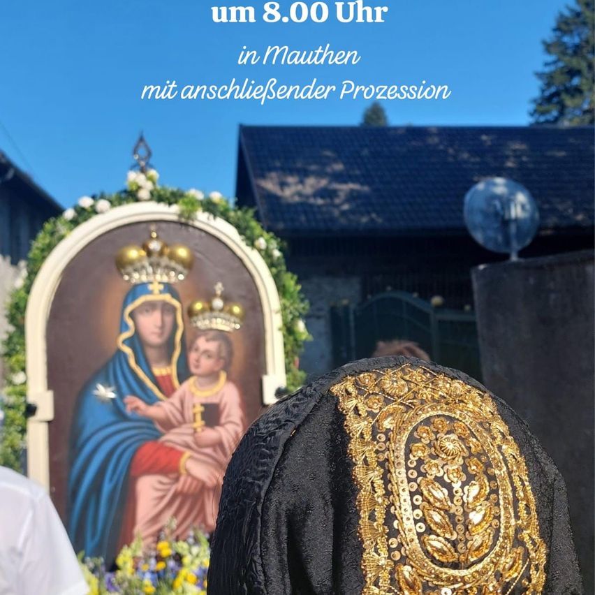 A religious procession is depicted in a photo, featuring a large painting of the Virgin Mary and Jesus with a golden crown. The image is set against a backdrop of a house with a satellite dish and a tree.