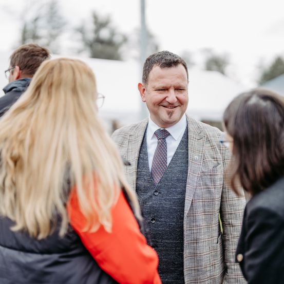 Person, Smile, Adult, Female, Woman, Male, Man, Suit, Coat, Tie