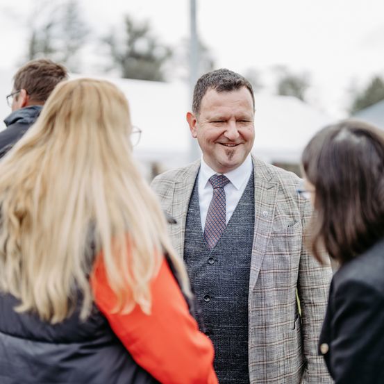 Adult, Female, Person, Woman, Smile, Coat, Male, Man, Suit, Tie