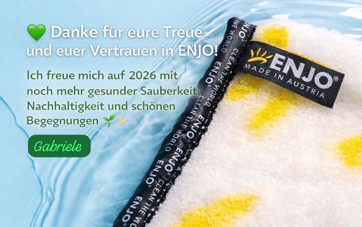 Eine Werbung für ENJO-Reinigungsmittel zeigt einen blauen Hintergrund mit einem Slogan, einer Versprechen für eine sauberere Welt und einem grünen Blattsymbol.
