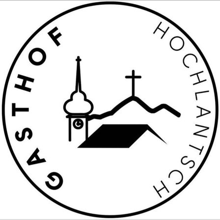 Ein kreisförmiges Logo mit einer Kirche, einem Turm und einem Kreuz, umgeben von dem Text 'ASTHO OF G HOCHLANTS SCHS'.
