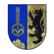 Ein Wappenschild, der in zwei Felder geteilt ist, mit einem schwarzen Bären auf der rechten und einem goldenen Weizengarben auf der linken Seite, beide auf blauem Hintergrund.