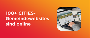 Das Bild zeigt einen Laptop auf einem Schreibtisch mit einem offenen Website-Design. Der Text 'IES-ewebsites' ist prominent angezeigt.