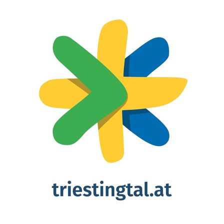 Das Bild zeigt ein Logo mit einem stilisierten Stern, der die Farben Gelb, Blau und Grün verwendet, darunter steht die Websiteadresse 'triestingtal.at'.