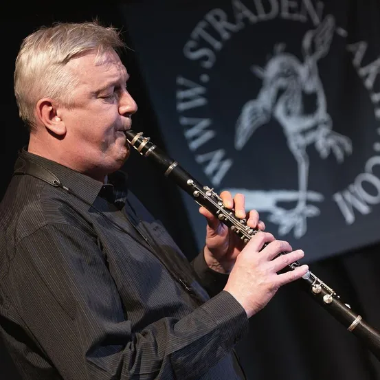 Electrical Device, Microphone, Adult, Male, Man, Person, Clarinet, Musical Instrument, Oboe, Face