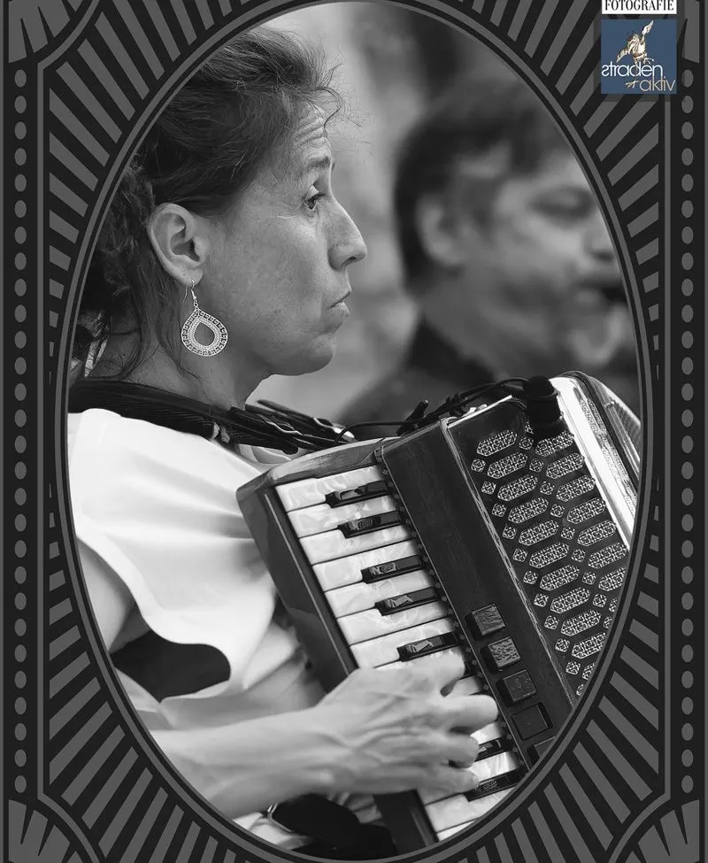 Person, Finger, Adult, Female, Woman, Photography, Face, Head, Musical Instrument, Accordion