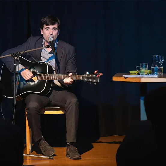Adult, Male, Man, Person, Guitar, Performer, Solo Performance, Guitarist, Music, Musician